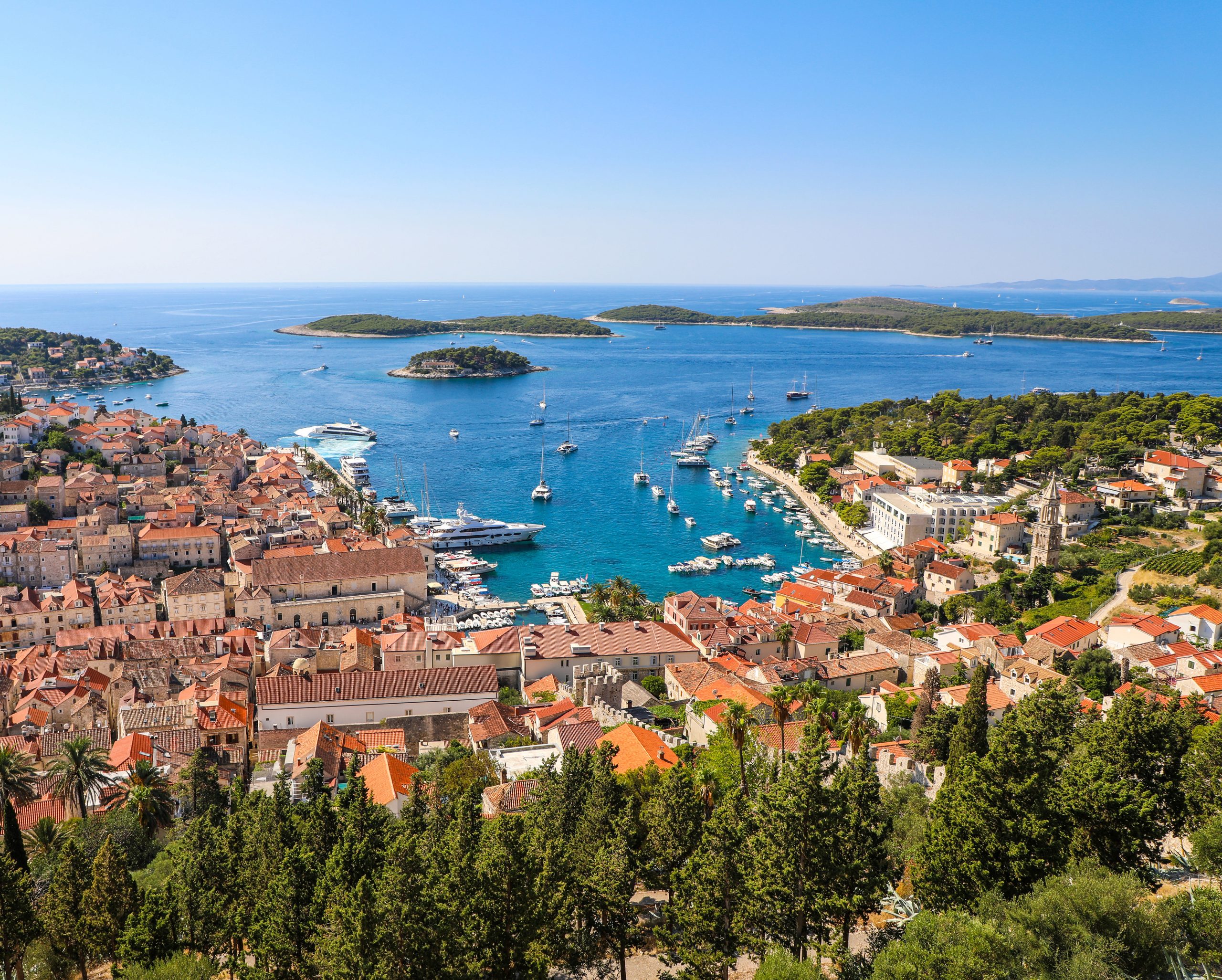 Aerial view of the bustling harbor and Old Town of Hvar Croatia